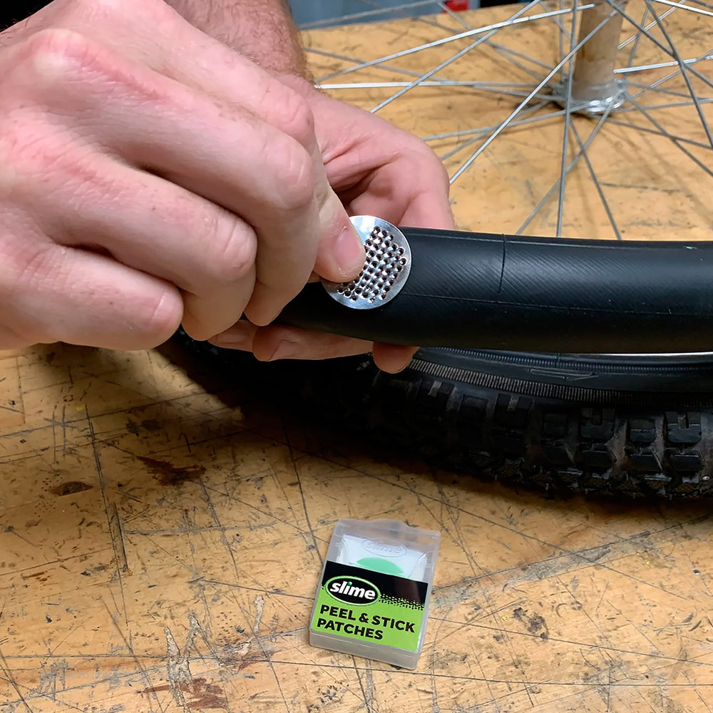 Parches adhesivos para reparar cámaras de bicicleta + desmontadores | Slime